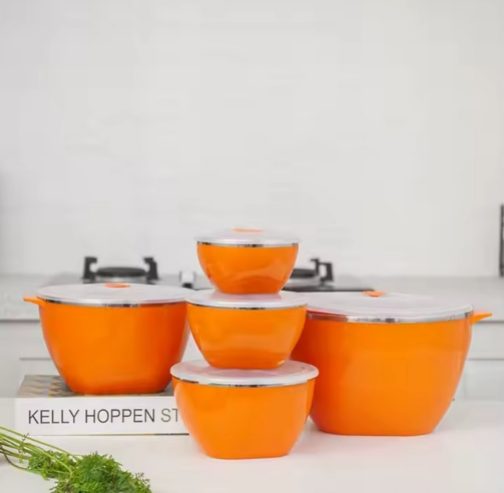 set of bright orange storage bowls with white lids.