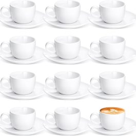 White Ceramic Tea Cups And A Matching Saucer